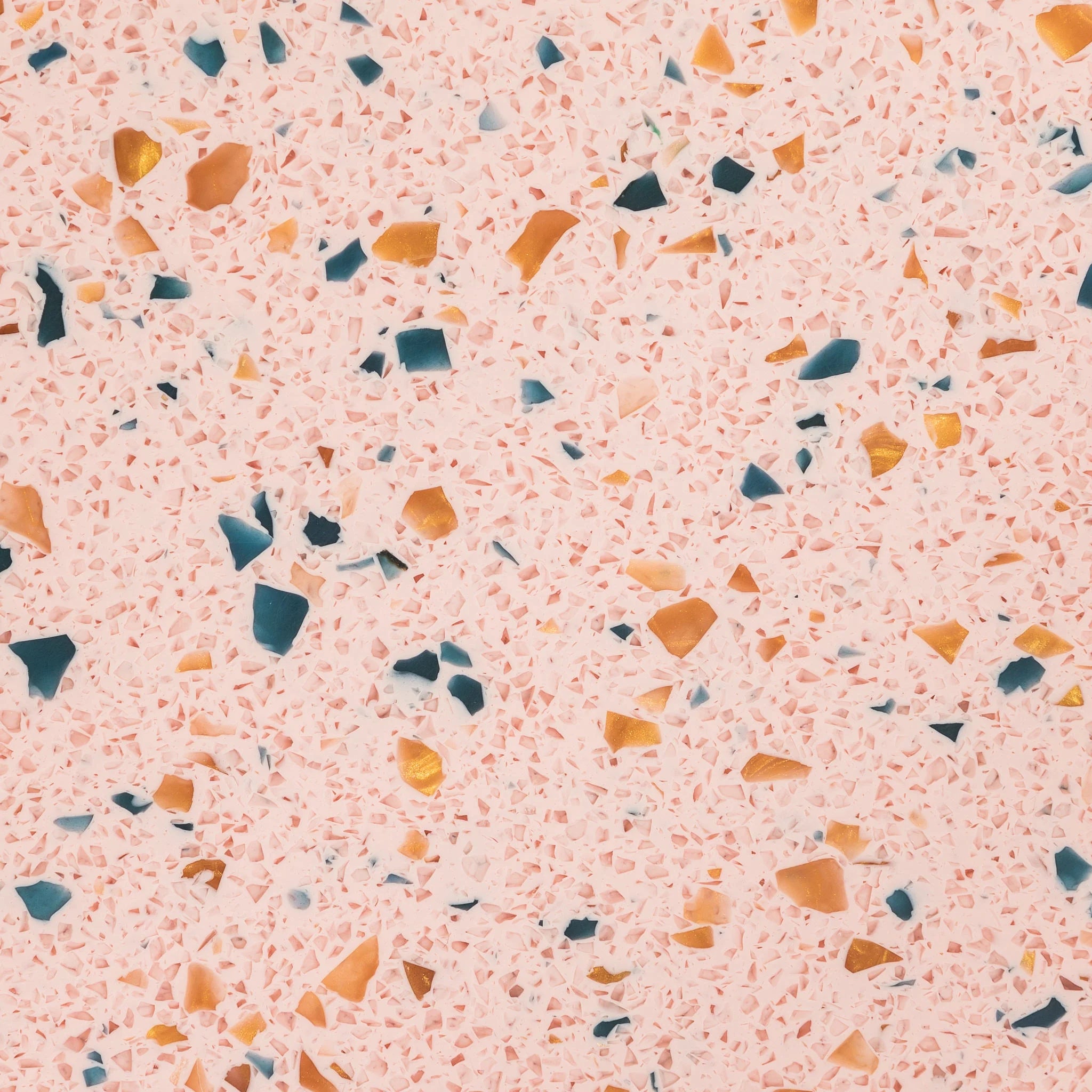 Terrazzo pattern with multicolored chips on a pink background - Polymer sheet