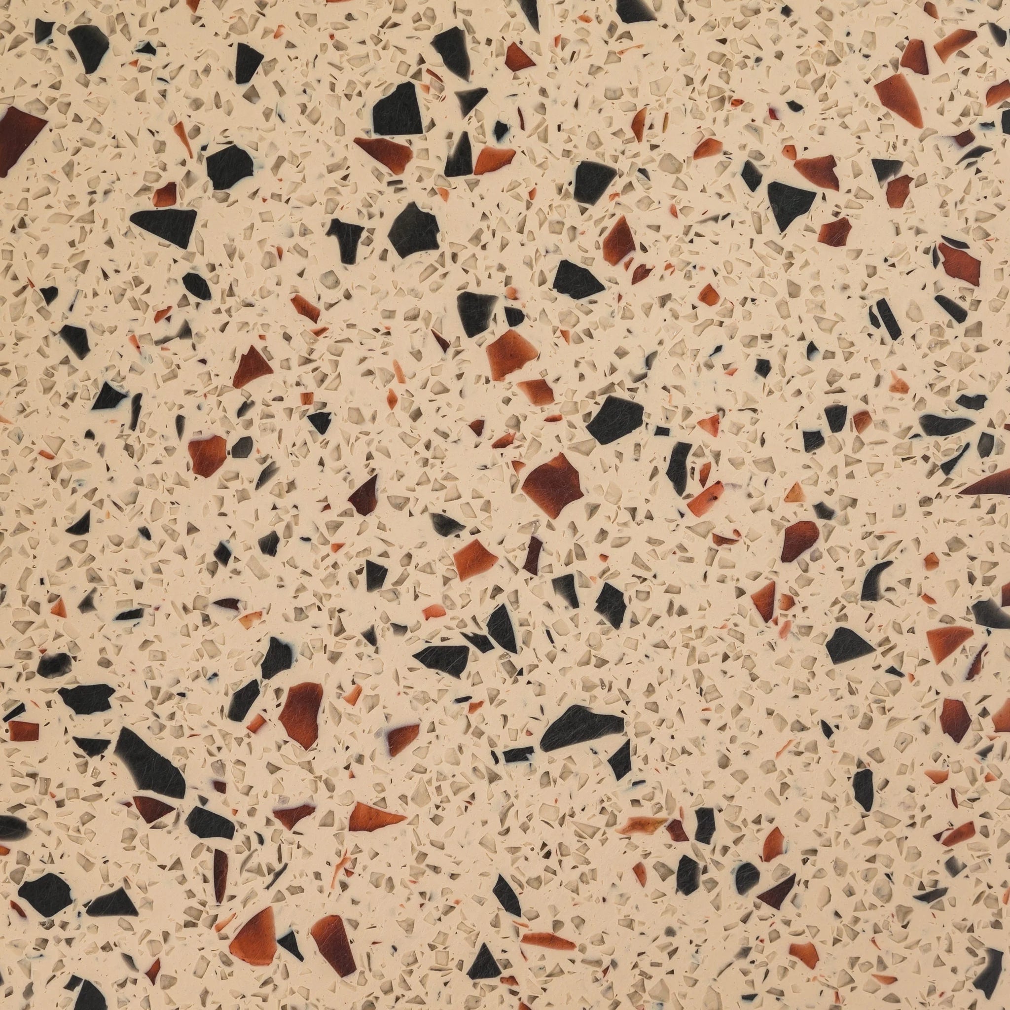 Terrazzo pattern with multicolored chips on a beige background - Polymer sheet