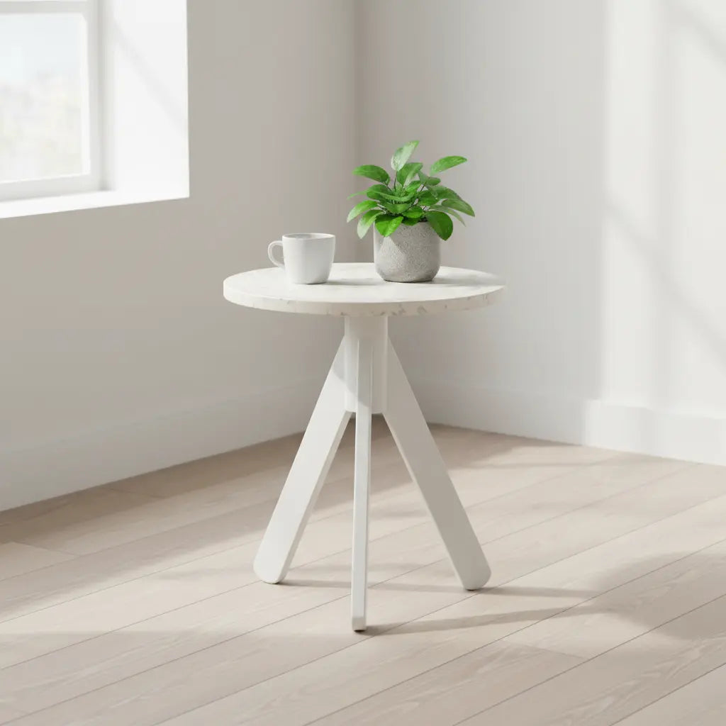 White eco-friendly polymer side table by a sunlit window, styled with a potted plant and coffee mug